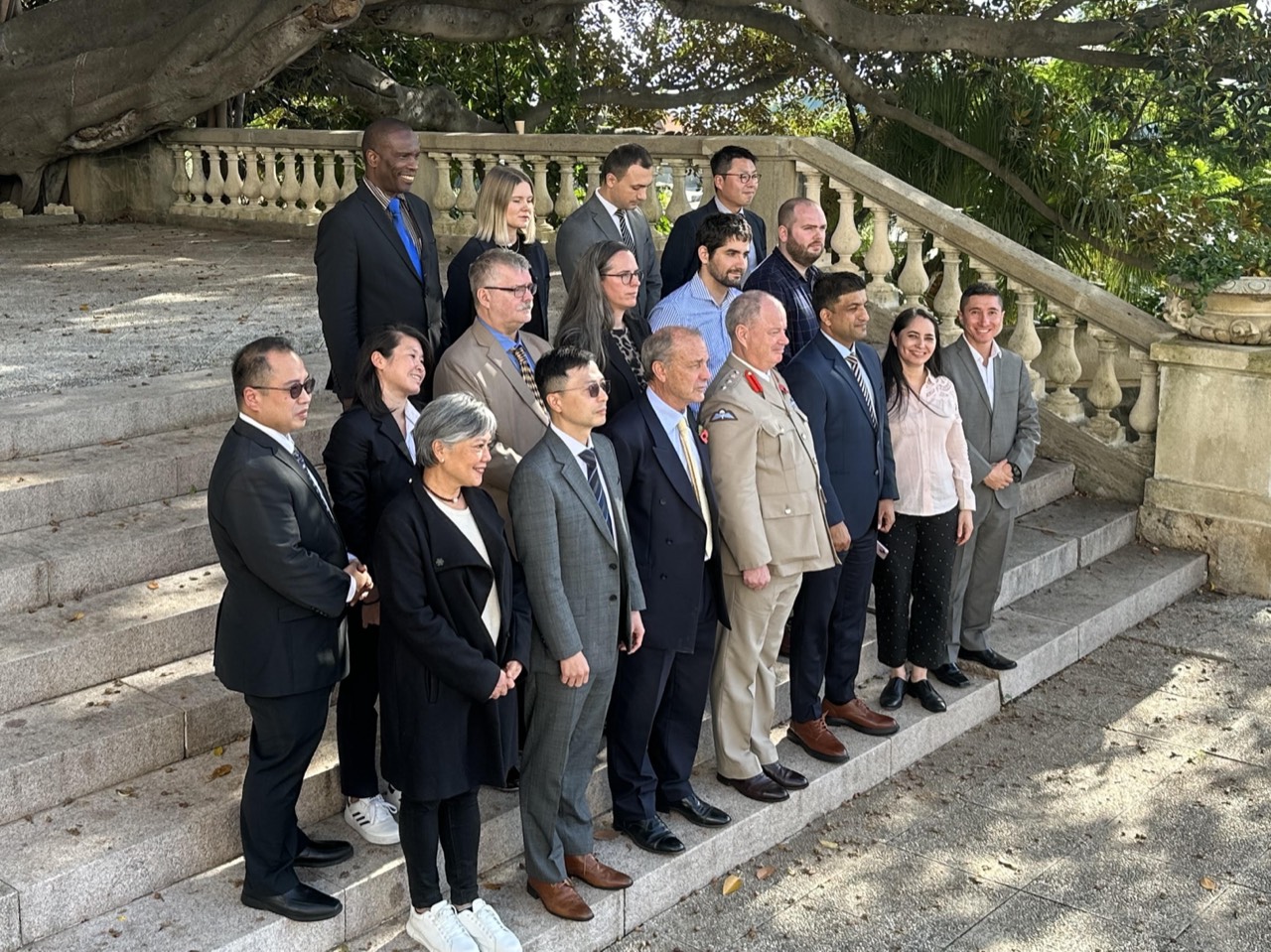 An international cohort on the steps of the International Institute of Humanitarian Law in Sanremo.