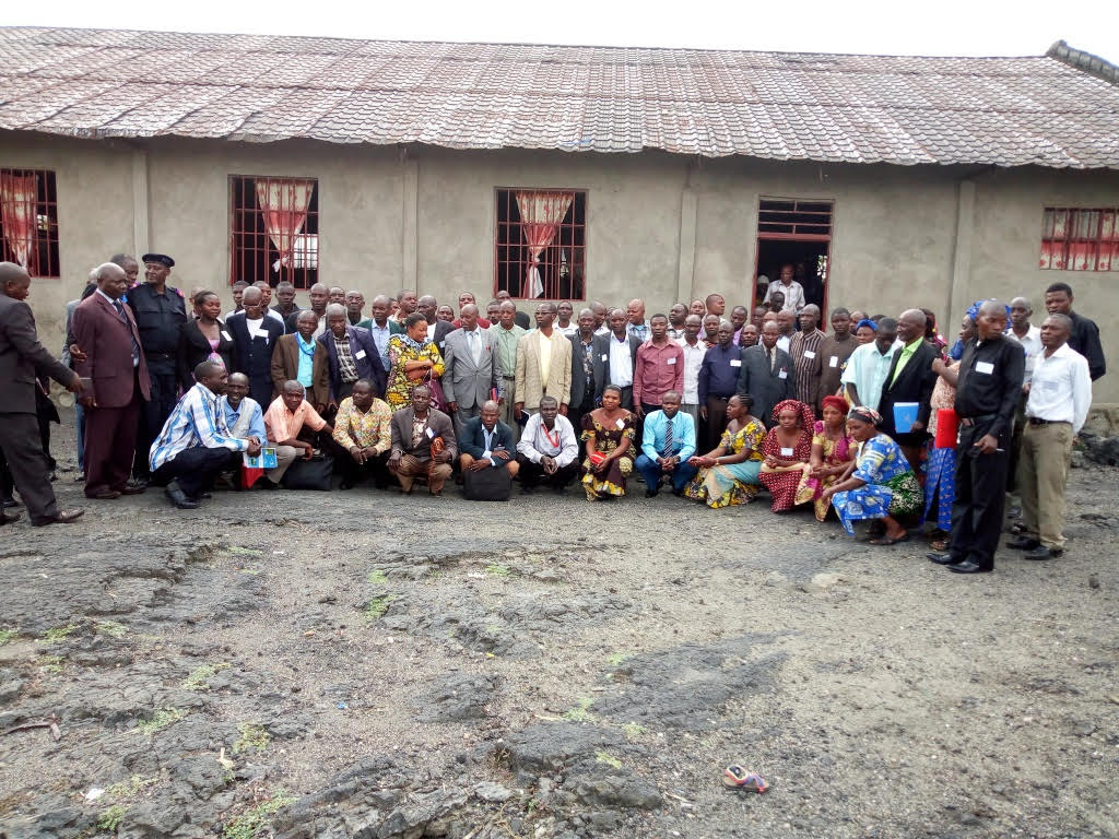 A community gathering for an APIDS public-health initiative.